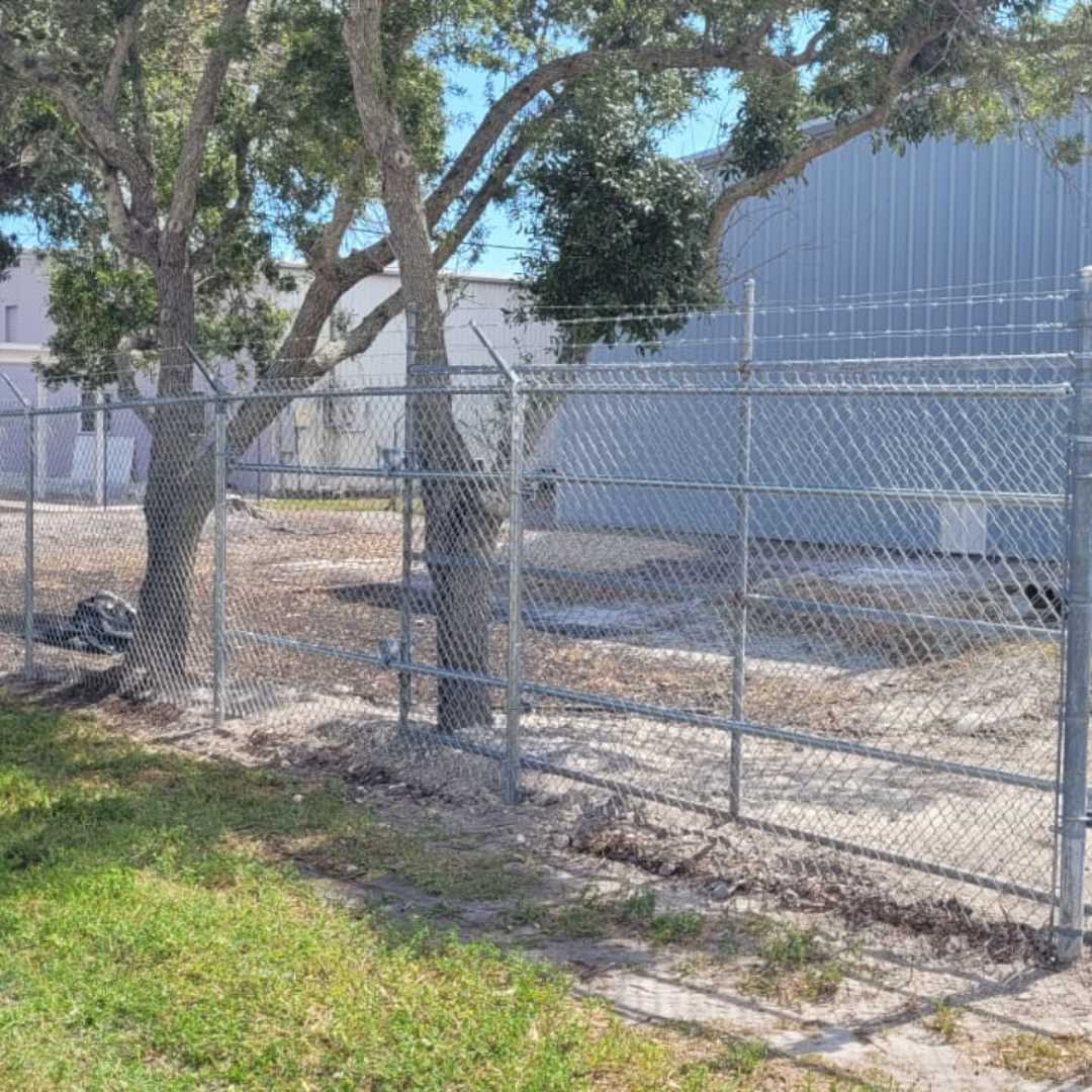 Chain link fence installation for a residential or commercial property by Costa Fence.